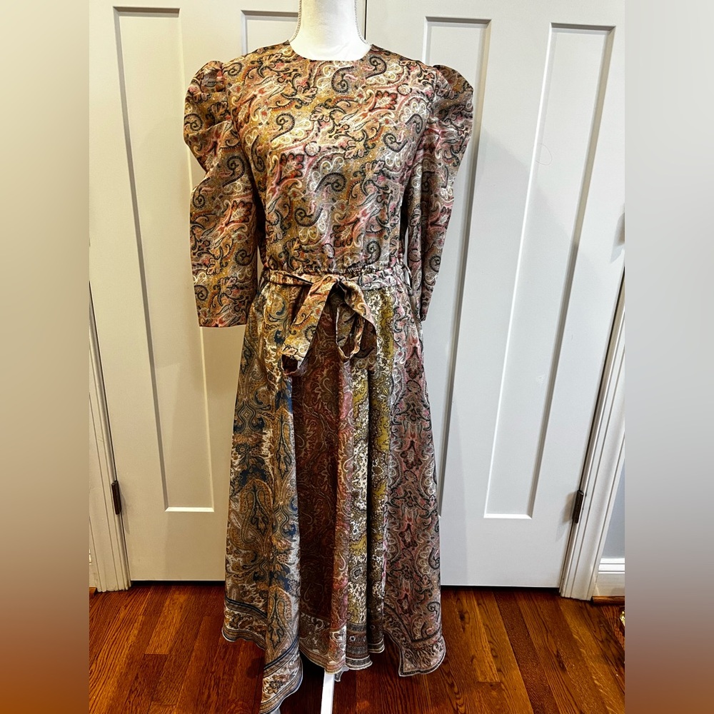 Long dress with asymmetrical bottom